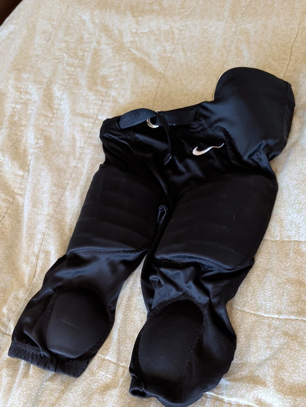 Nike Kids Black Padded Hockey Pants with White Swoosh